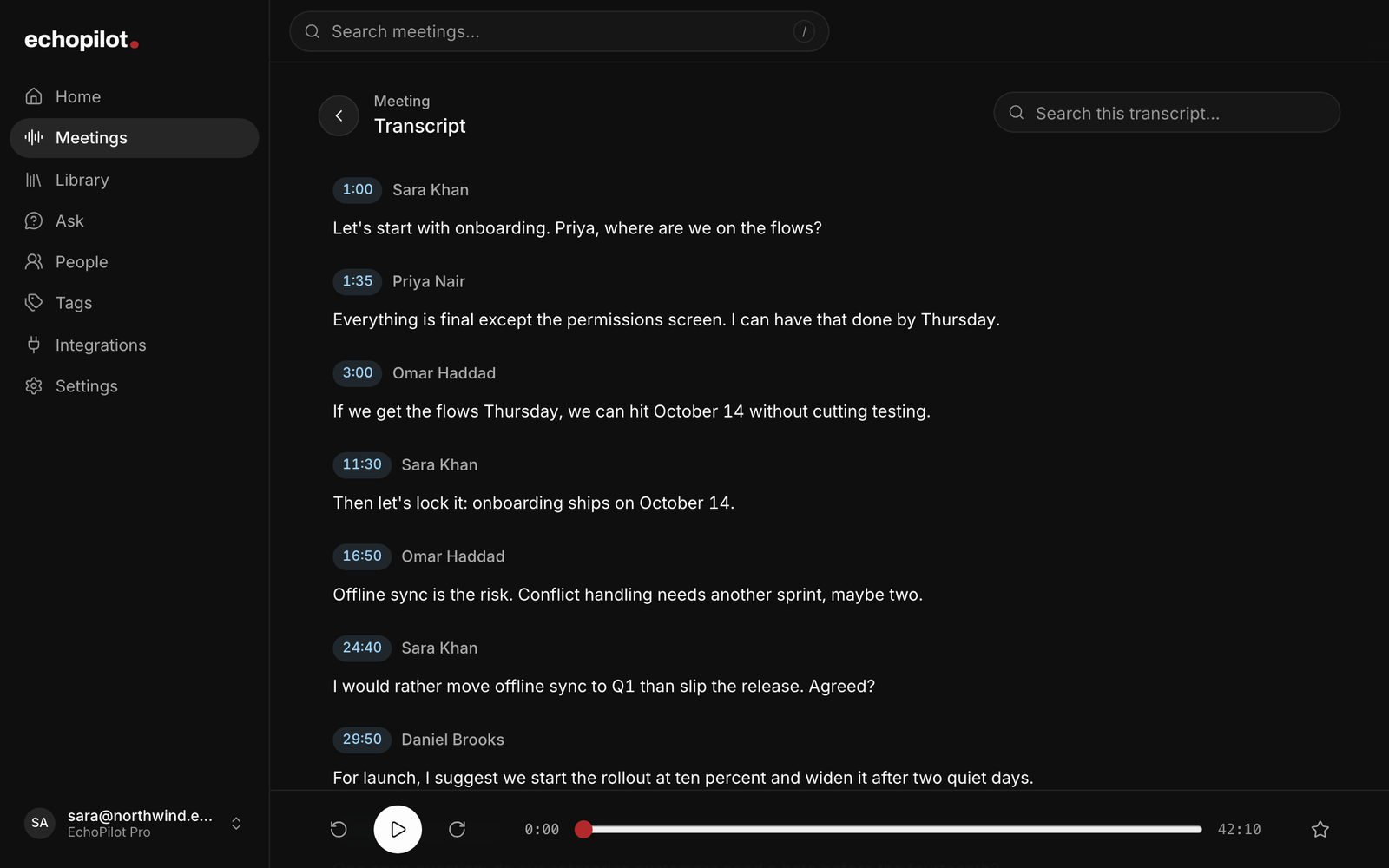 The transcript of a recorded call in the web app, speaker by speaker with timestamps, above the audio player